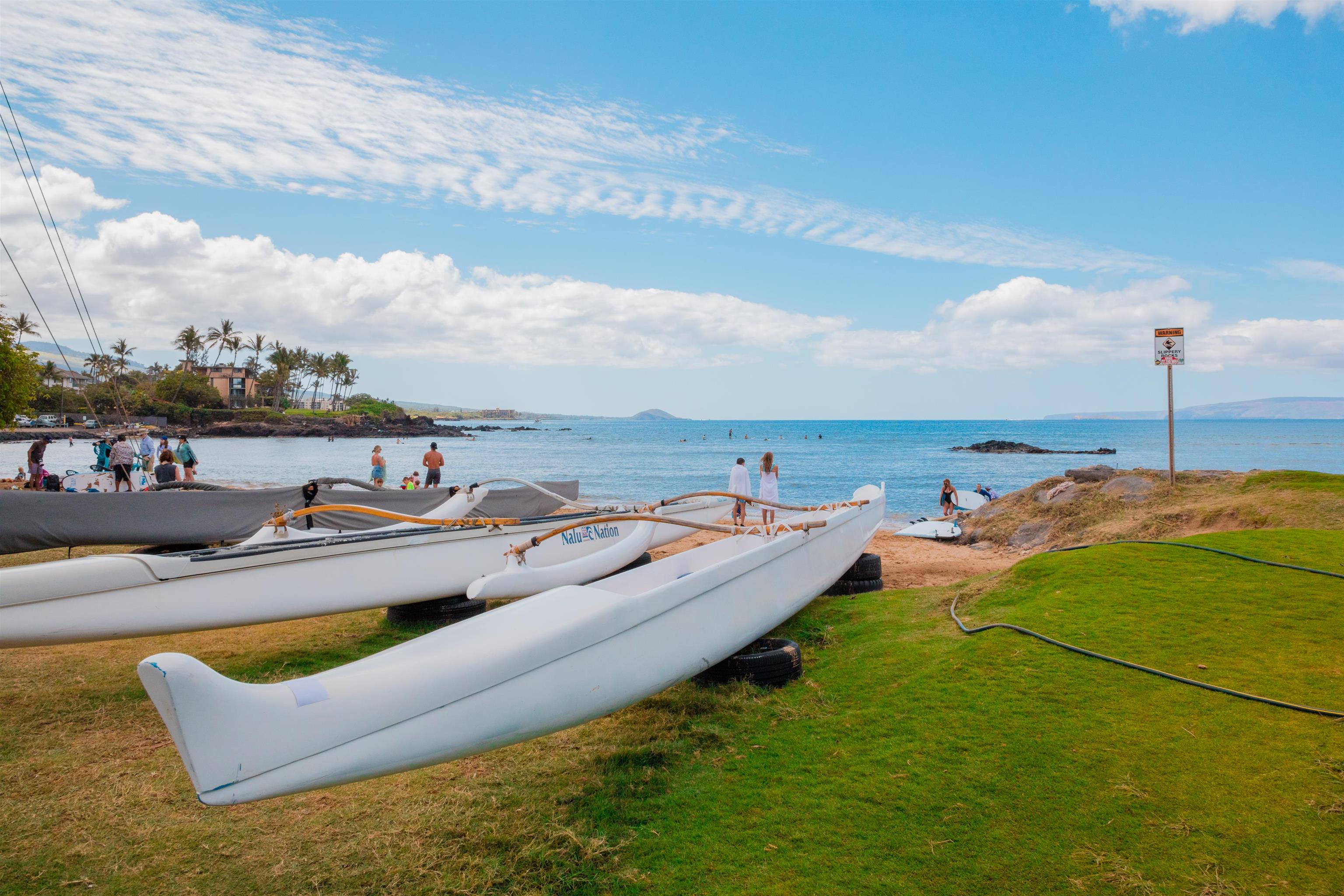 2191 South Kihei Road, Unit 3402 Kihei, HI 96753 - Photo 40 of 50 a view of a swimming pool with lounge chairs