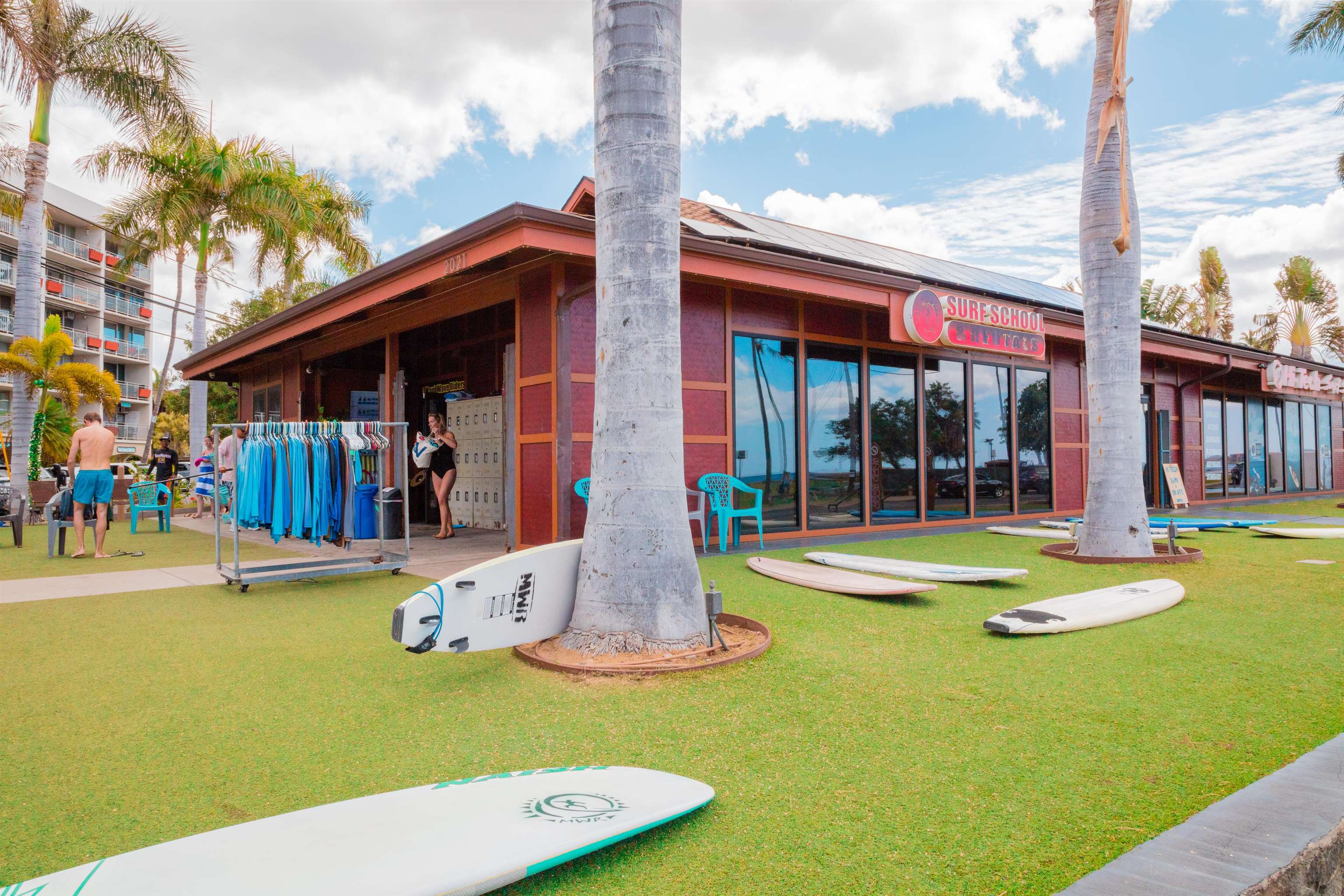 2191 South Kihei Road, Unit 3402 Kihei, HI 96753 - Photo 44 of 50 a view of a swimming pool with a lawn chairs under an umbrella