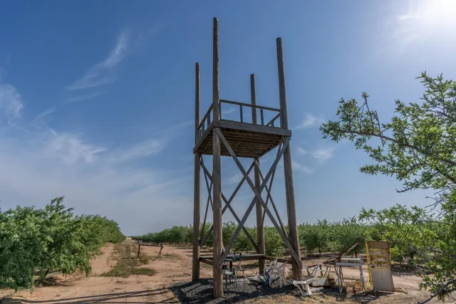 an aerial view of a house with outdoor space