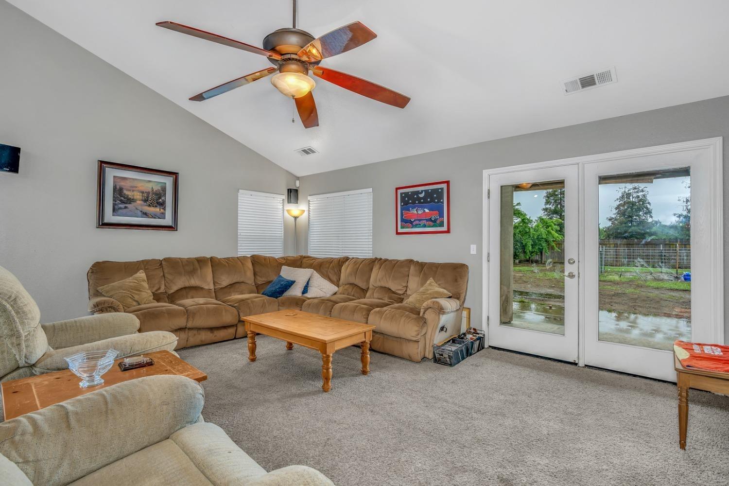 14155 Buchanan Hollow Road Le Grand, CA 95333 - Photo 27 of 46 a living room with furniture and a window