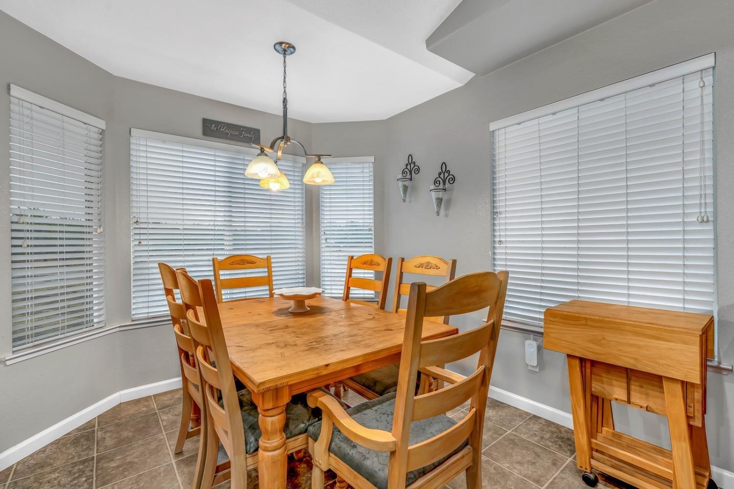 14155 Buchanan Hollow Road Le Grand, CA 95333 - Photo 30 of 46 a view of a dining room with furniture and window