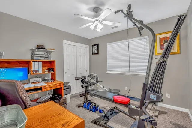 a bathroom with a granite countertop sink mirror and double