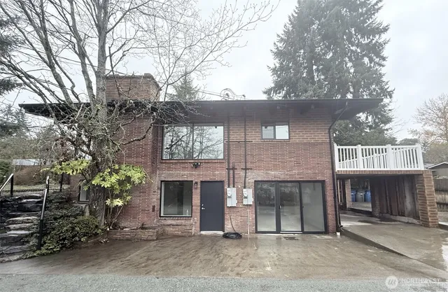 a front view of a house with yard
