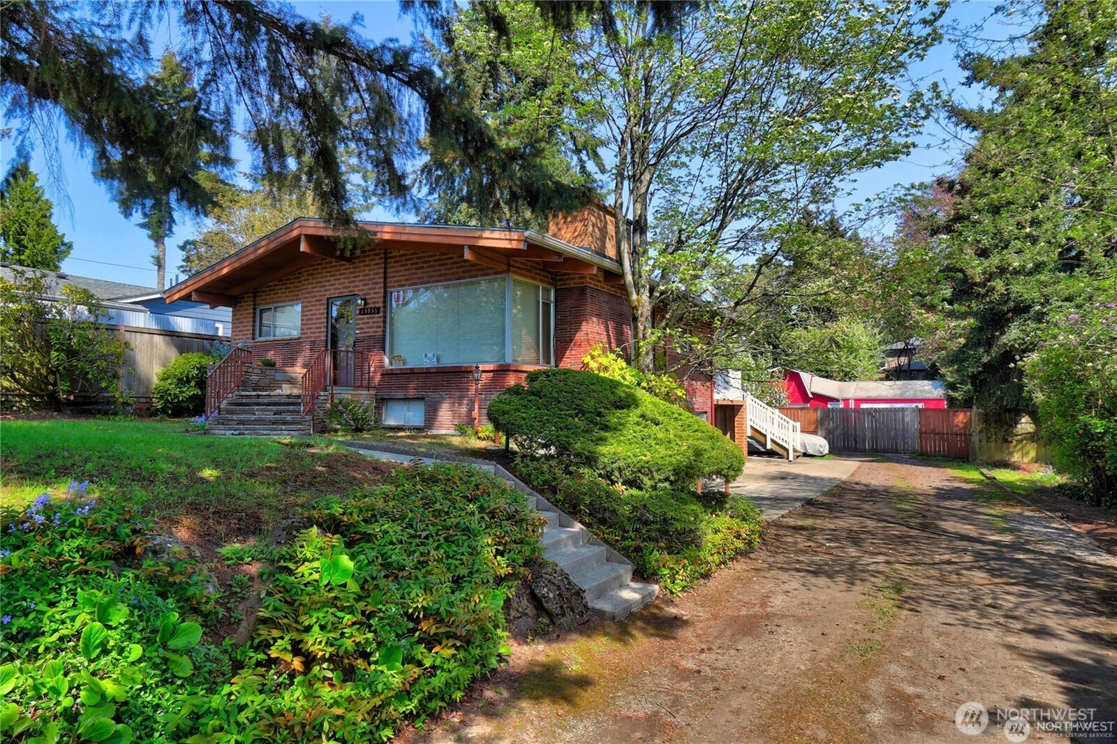13936 4th Avenue Southwest, Unit A Burien, WA 98166 - Photo 14 of 14 a view of a house with a yard and tree