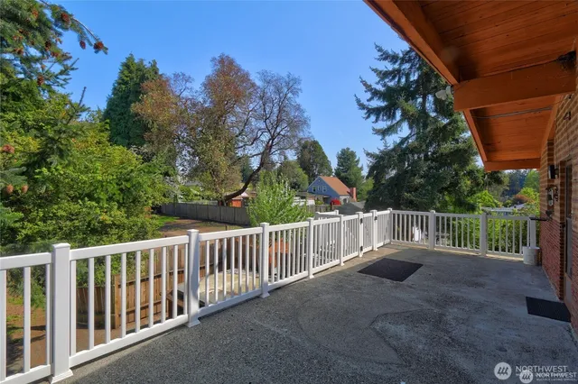 a balcony with a small yard