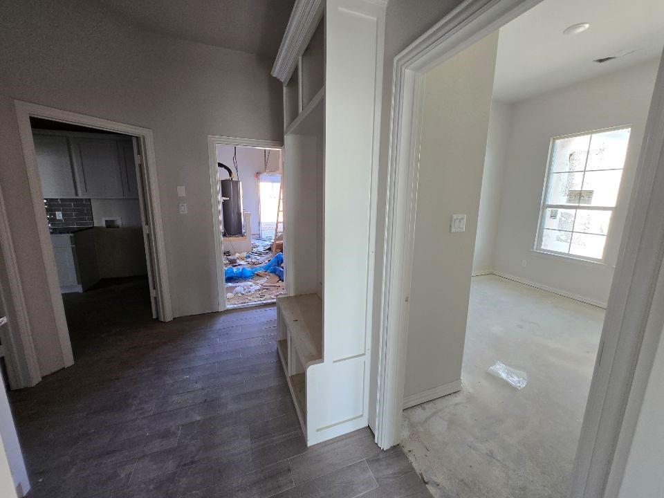 118 Hillview Trail Decatur, TX 76234 - Photo 13 of 22 a view of a hallway with furniture and wooden floor