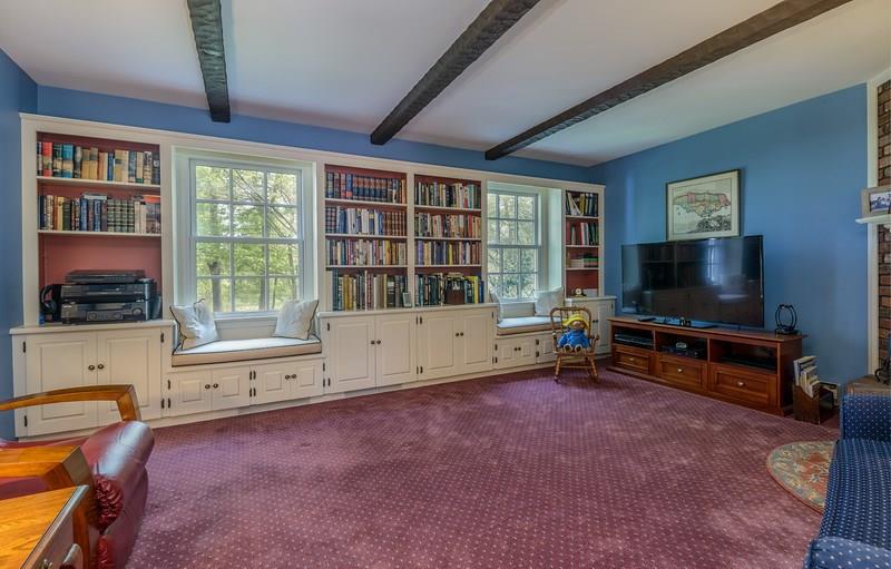 135 Witherow Road Sewickley, PA 15143 - Photo 14 of 25 Built in bookcases and double window seats add to the attraction of the family room.