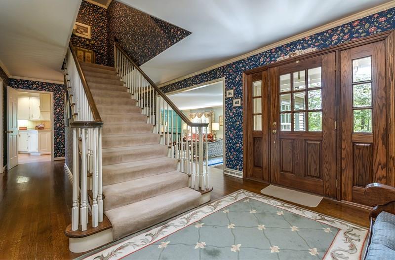 135 Witherow Road Sewickley, PA 15143 - Photo 6 of 25 Welcome to 135 Witherow. Spacious entry leads to formal living room, family room, first floor bedroom and full bath, kitchen, dining room, and laundry.