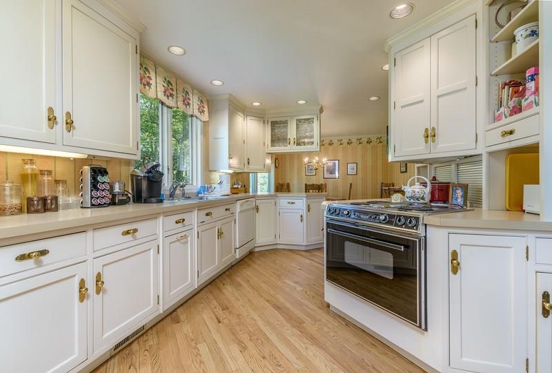 135 Witherow Road Sewickley, PA 15143 - Photo 10 of 25 The cook will enjoy all the light and counter space in the kitchen. Abundant down lighting. Separate casual dining space with views of the side yard.