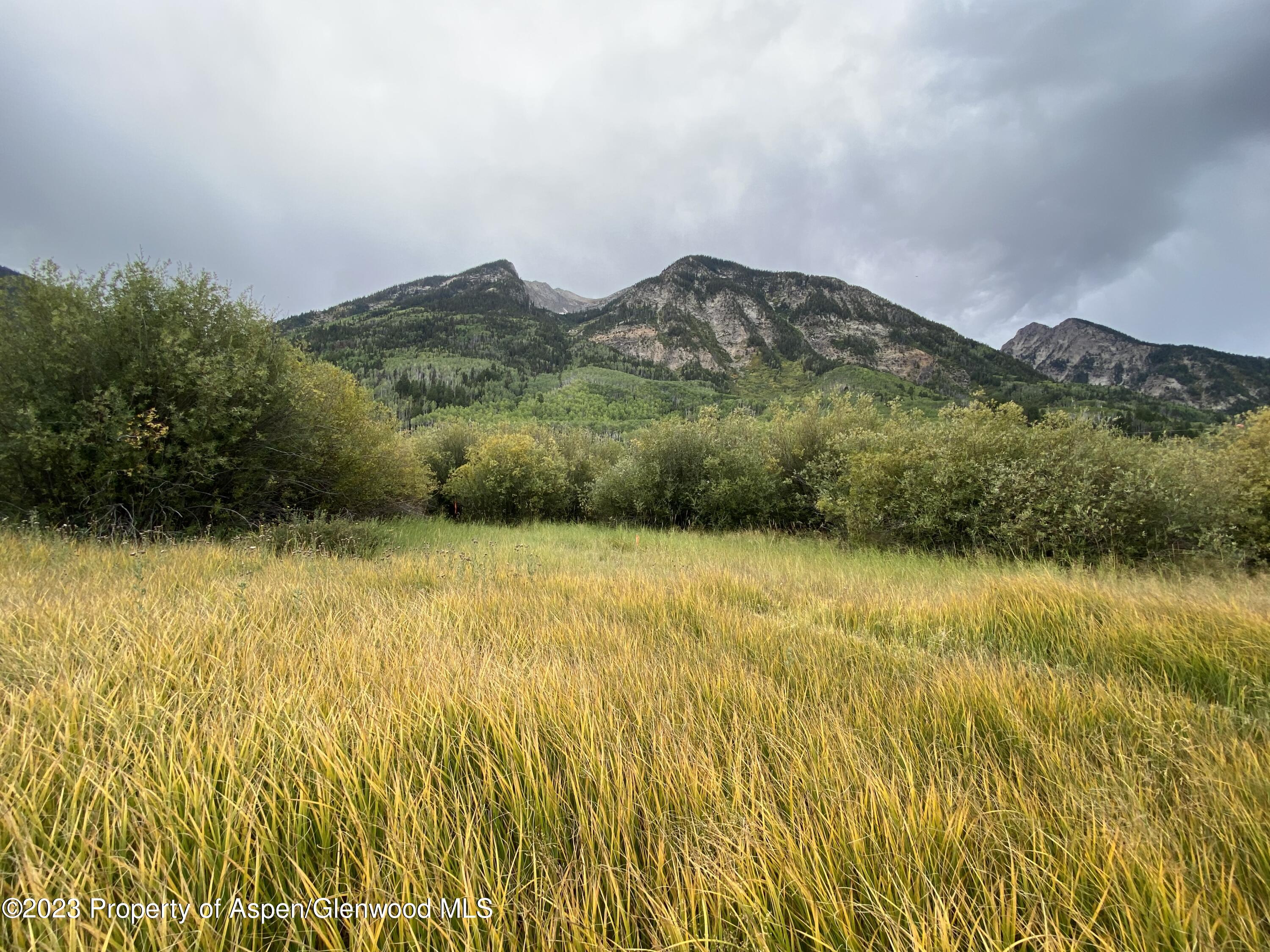 a view of an outdoor space and mountains
