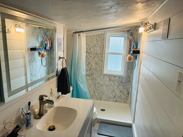 a bathroom with a sink and a tub
