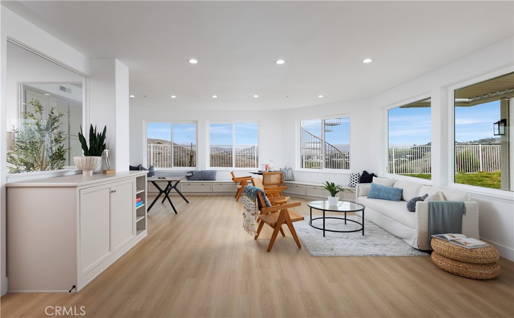 2001 Via Aguila San Clemente, CA 92673 - Photo 18 of 53 a living room with furniture and a large window