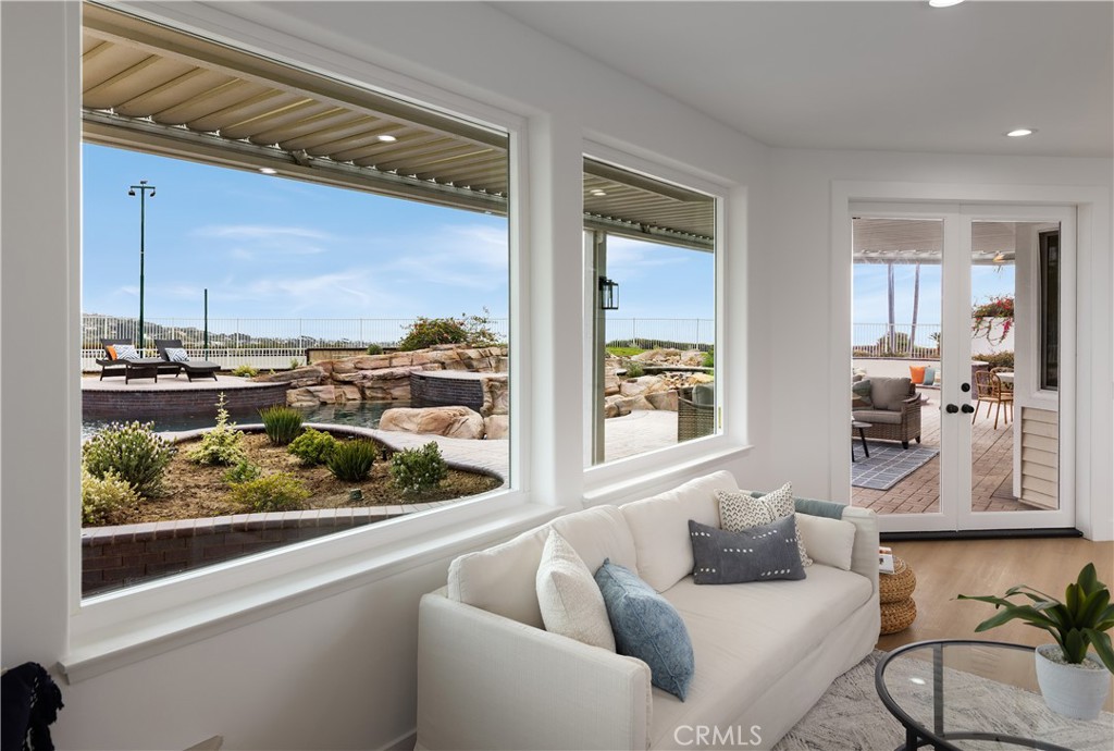 2001 Via Aguila San Clemente, CA 92673 - Photo 20 of 53 a living room with furniture and a large window