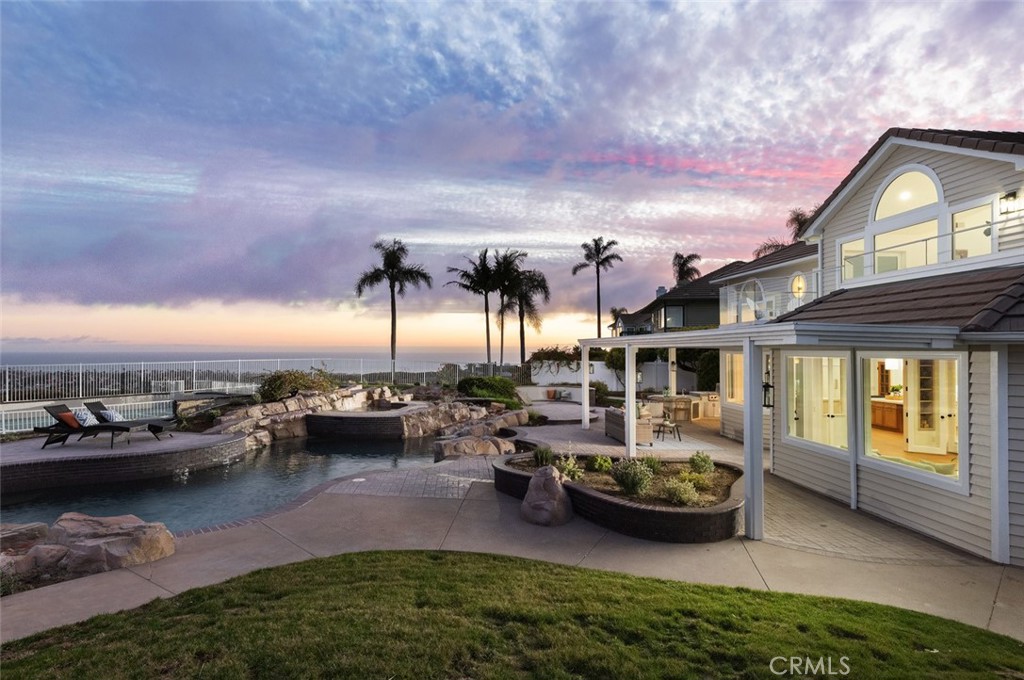 2001 Via Aguila San Clemente, CA 92673 - Photo 2 of 53 a view of a swimming pool with lounge chairs in patio