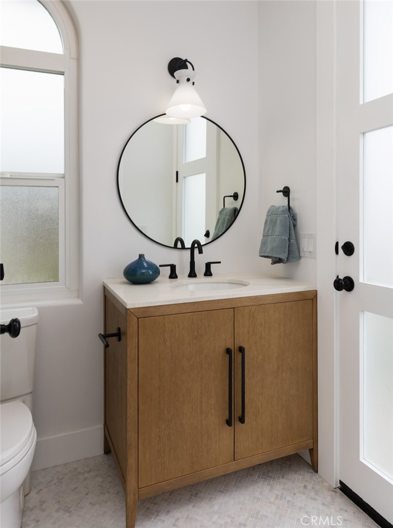 2001 Via Aguila San Clemente, CA 92673 - Photo 21 of 53 a bathroom with a sink and a mirror