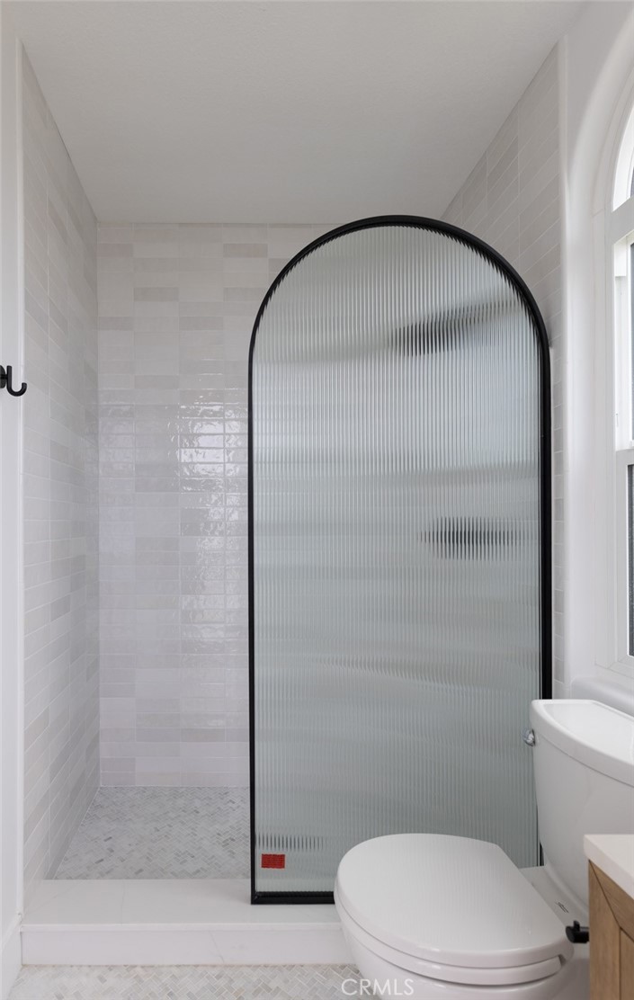 2001 Via Aguila San Clemente, CA 92673 - Photo 22 of 53 a bathroom with a toilet and a shower