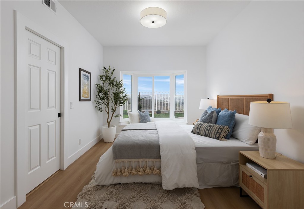 2001 Via Aguila San Clemente, CA 92673 - Photo 23 of 53 a bedroom with a large bed and a window