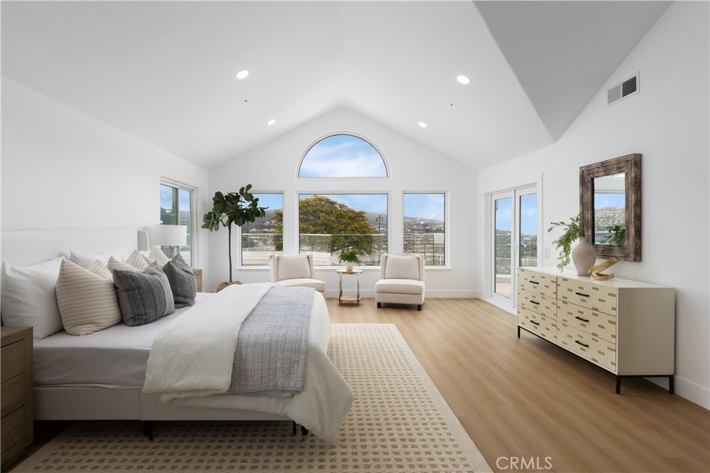 2001 Via Aguila San Clemente, CA 92673 - Photo 25 of 53 a spacious bedroom with a large bed and a large window