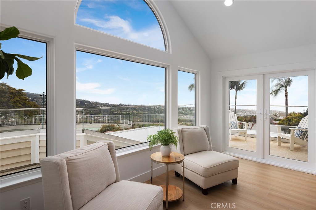2001 Via Aguila San Clemente, CA 92673 - Photo 26 of 53 a living room with furniture and a floor to ceiling window