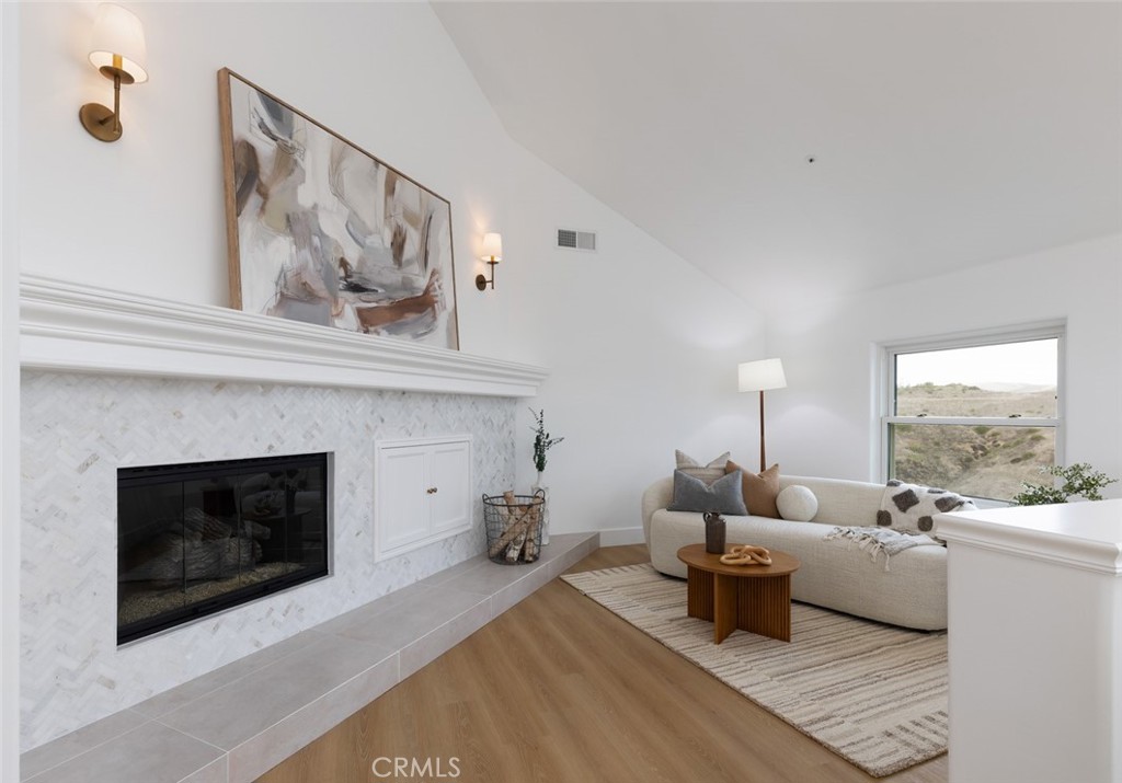 2001 Via Aguila San Clemente, CA 92673 - Photo 27 of 53 a living room with furniture and a fireplace