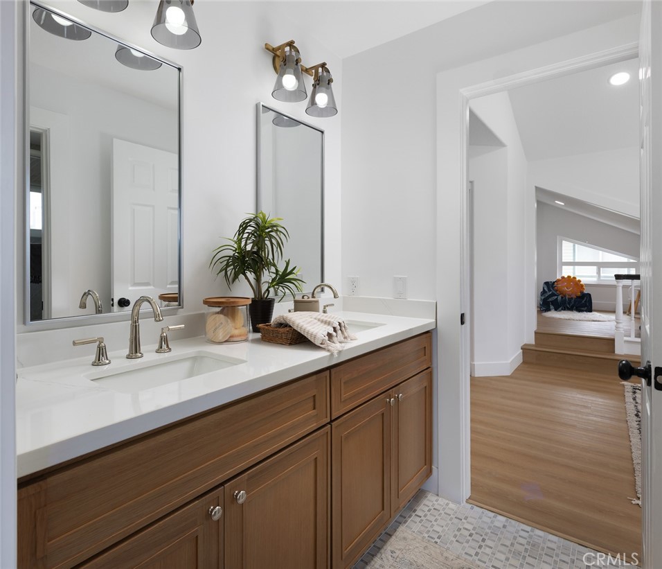 2001 Via Aguila San Clemente, CA 92673 - Photo 35 of 53 a en suite bathroom with a sink and a mirror