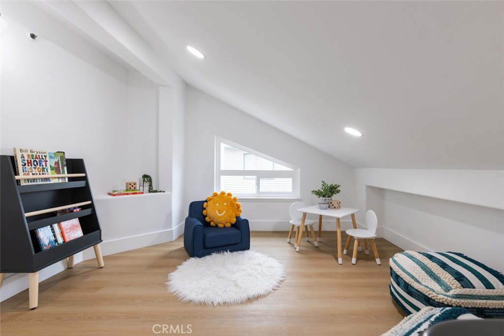 2001 Via Aguila San Clemente, CA 92673 - Photo 38 of 53 a living room with furniture and a book shelf