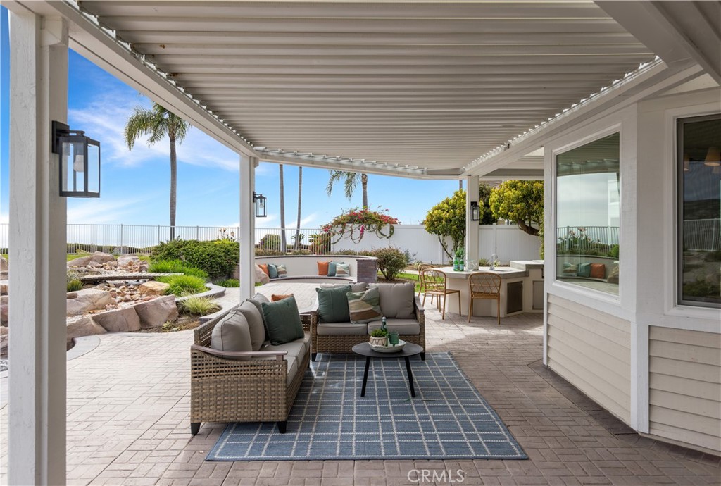2001 Via Aguila San Clemente, CA 92673 - Photo 42 of 53 a living room with furniture and a large window