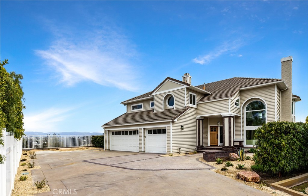 2001 Via Aguila San Clemente, CA 92673 - Photo 6 of 53 a front view of a house with a yard