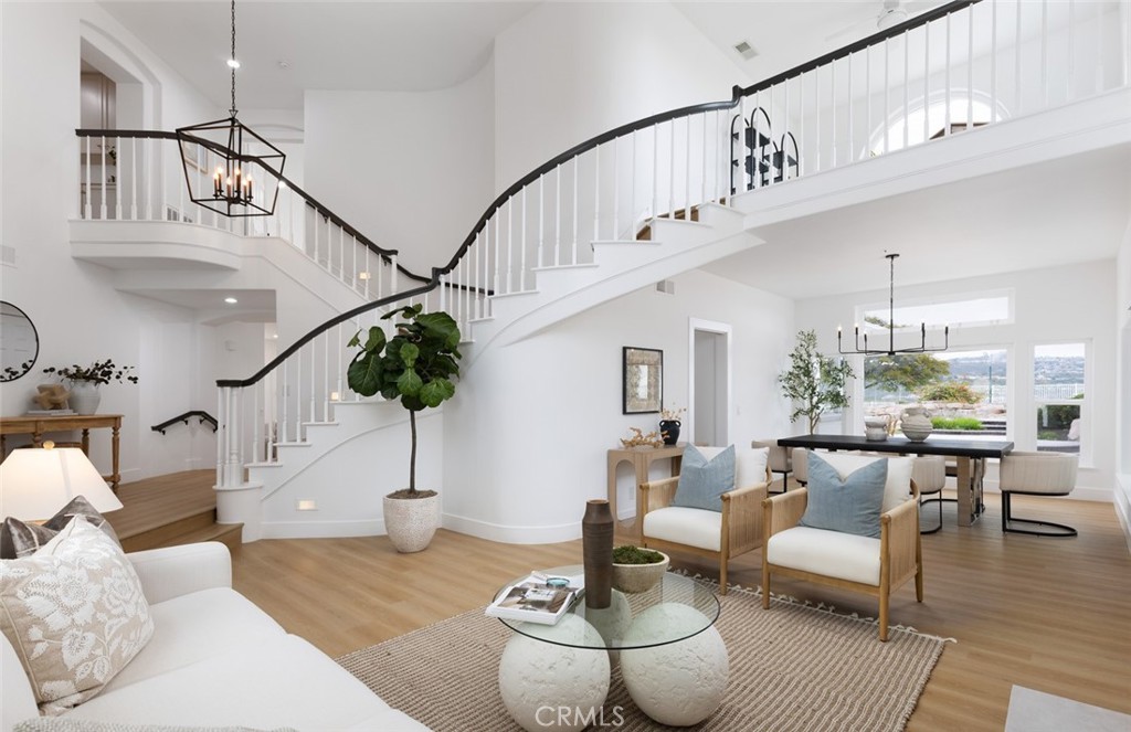 2001 Via Aguila San Clemente, CA 92673 - Photo 9 of 53 a living room with couches potted plants with wooden floor