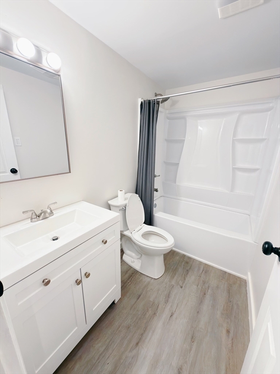 206 Treetop Avenue Springfield, MA 01118 - Photo 6 of 16 a bathroom with a double vanity sink toilet mirror and shower