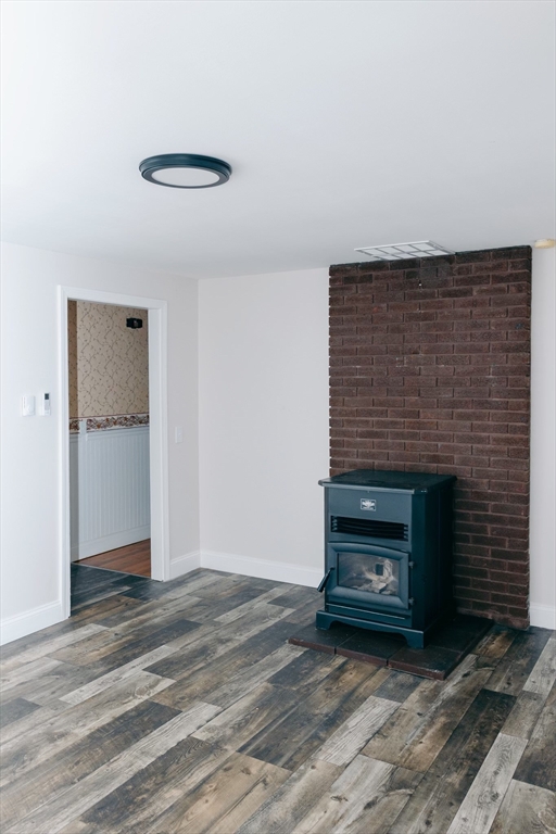 206 Treetop Avenue Springfield, MA 01118 - Photo 8 of 16 a view of empty room with a fireplace