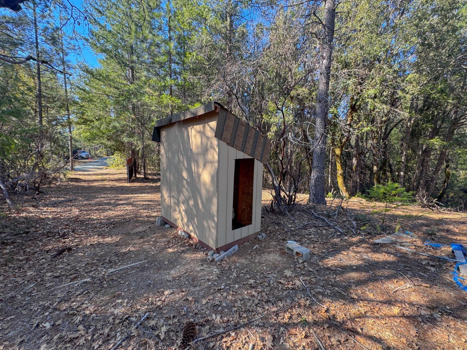 17414 You Bet Road Grass Valley, CA 95945 - Photo 18 of 18 a view of a house with a yard and tree