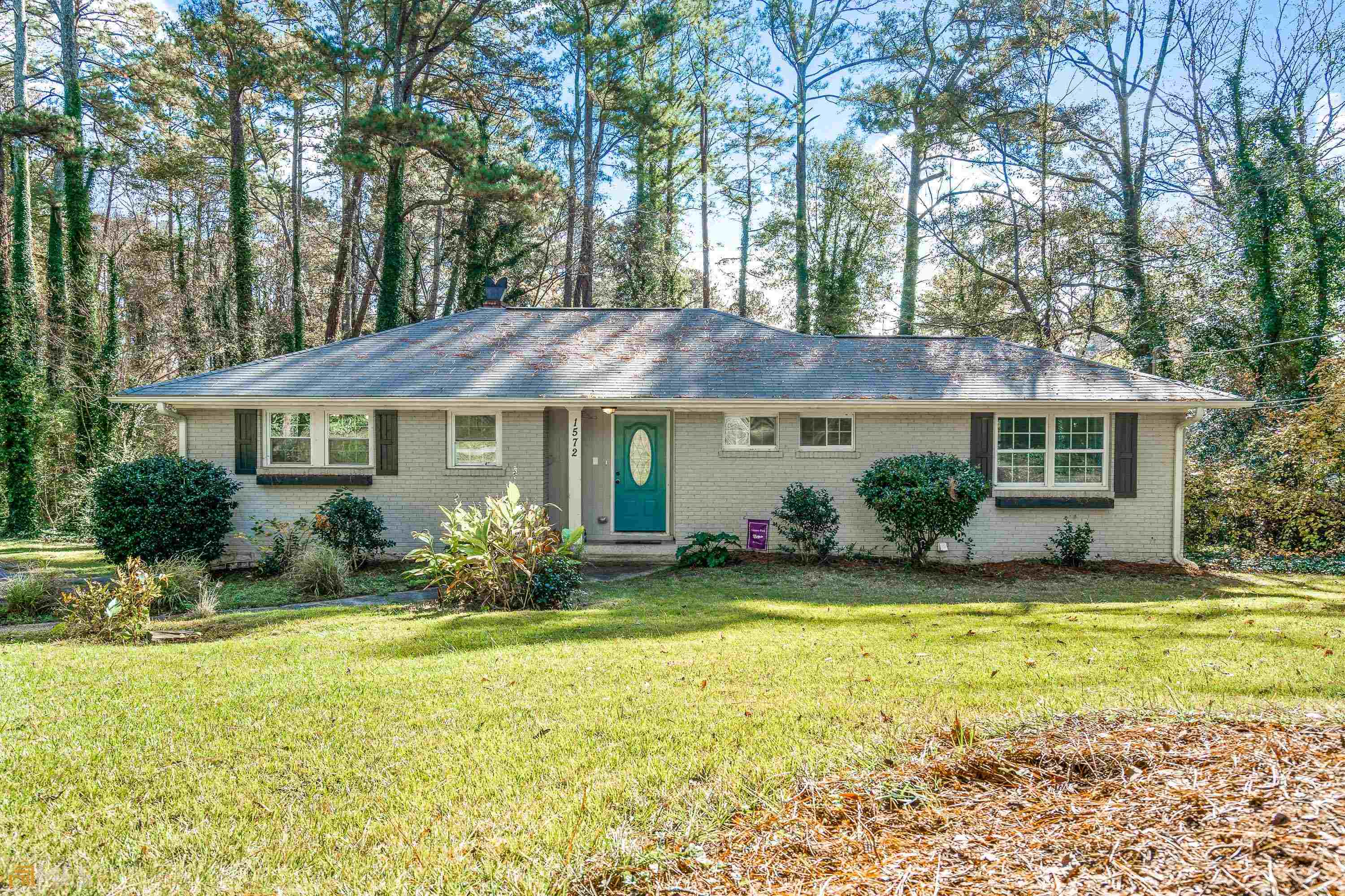 1572 Willis Mill Road Southwest, Unit B Atlanta, GA 30311 - Photo 1 of 1 a front view of a house with garden