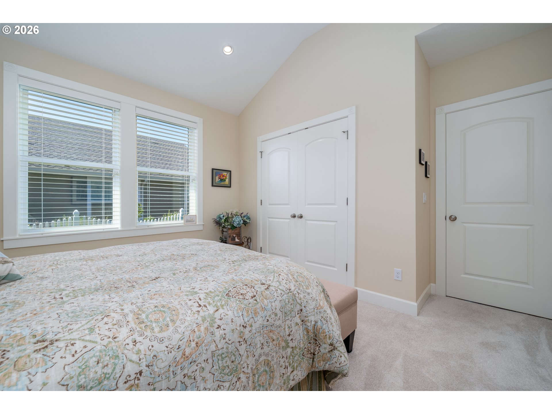 175 Southwest 59th Street South Beach, OR 97366 - Photo 19 of 48 a bedroom with a bed and a large window