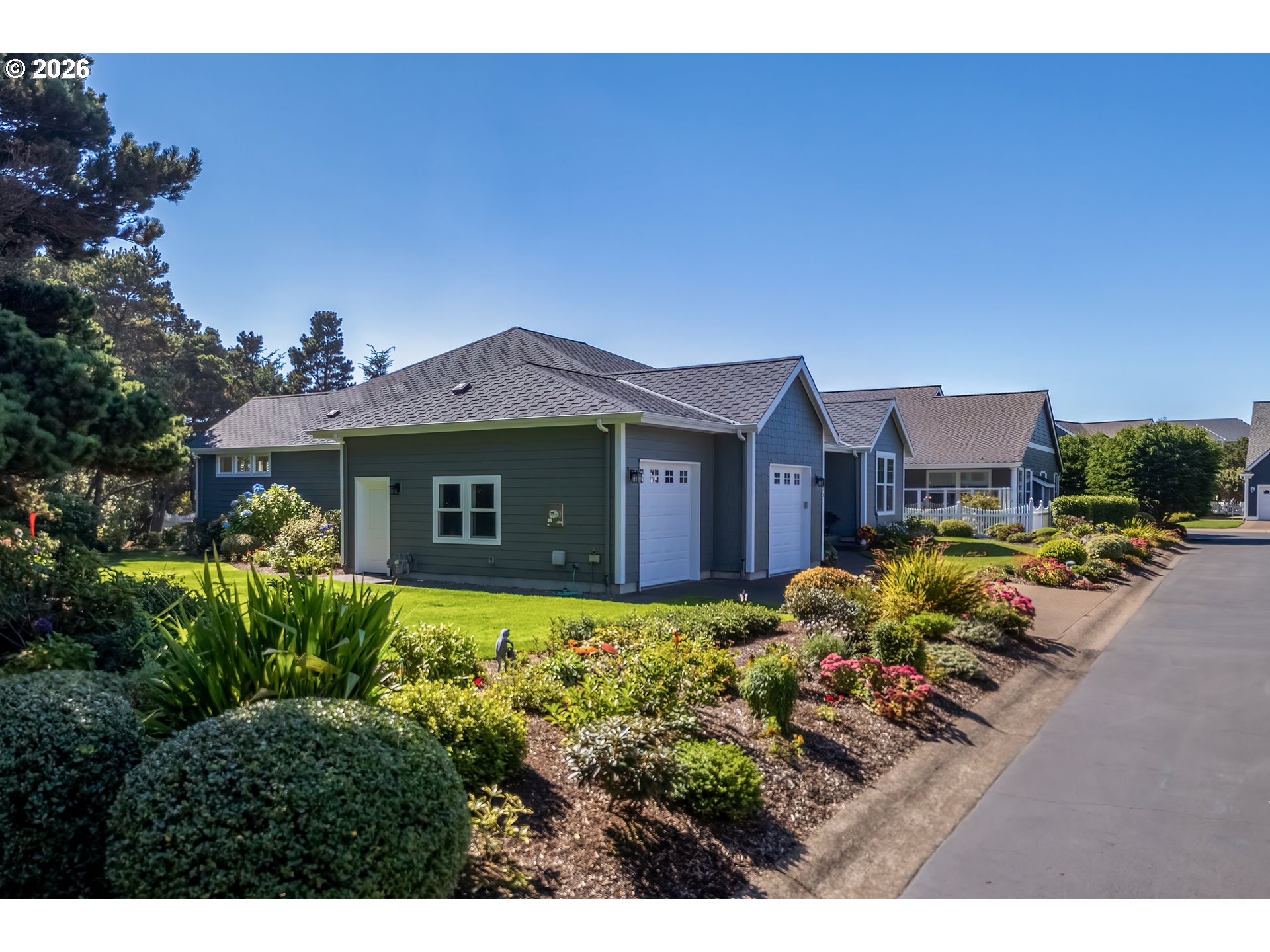 175 Southwest 59th Street South Beach, OR 97366 - Photo 2 of 48 a view of a house with a garden