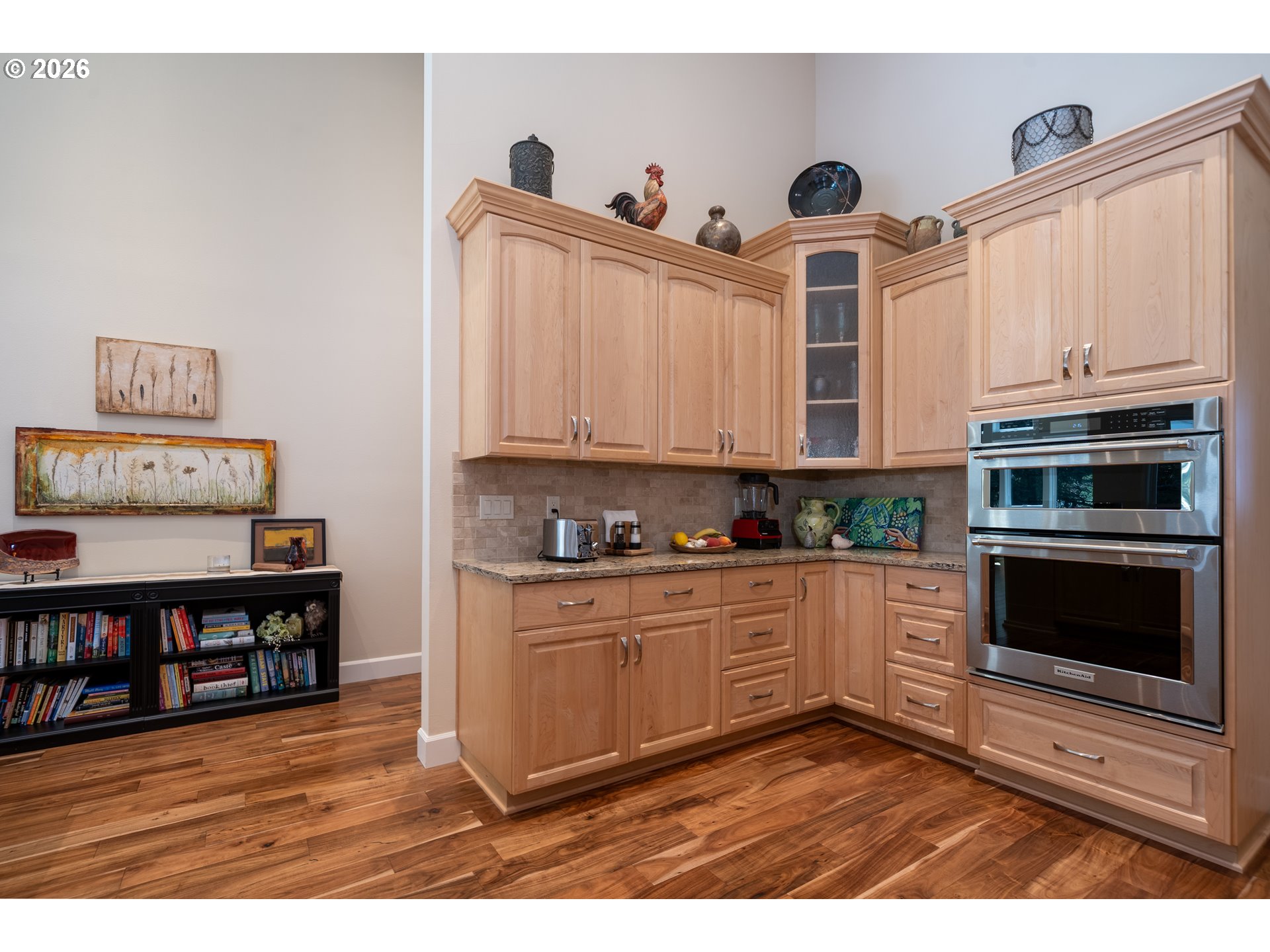 175 Southwest 59th Street South Beach, OR 97366 - Photo 23 of 48 a kitchen with stainless steel appliances granite countertop a stove a sink and a microwave