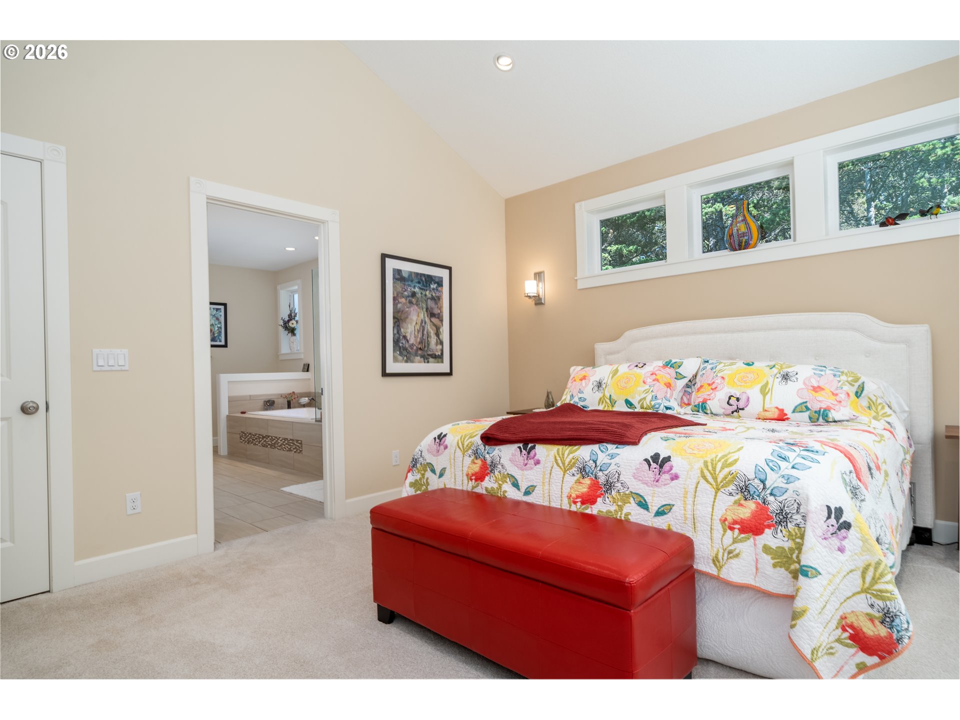 175 Southwest 59th Street South Beach, OR 97366 - Photo 35 of 48 a bedroom with a bed and a painting on the wall