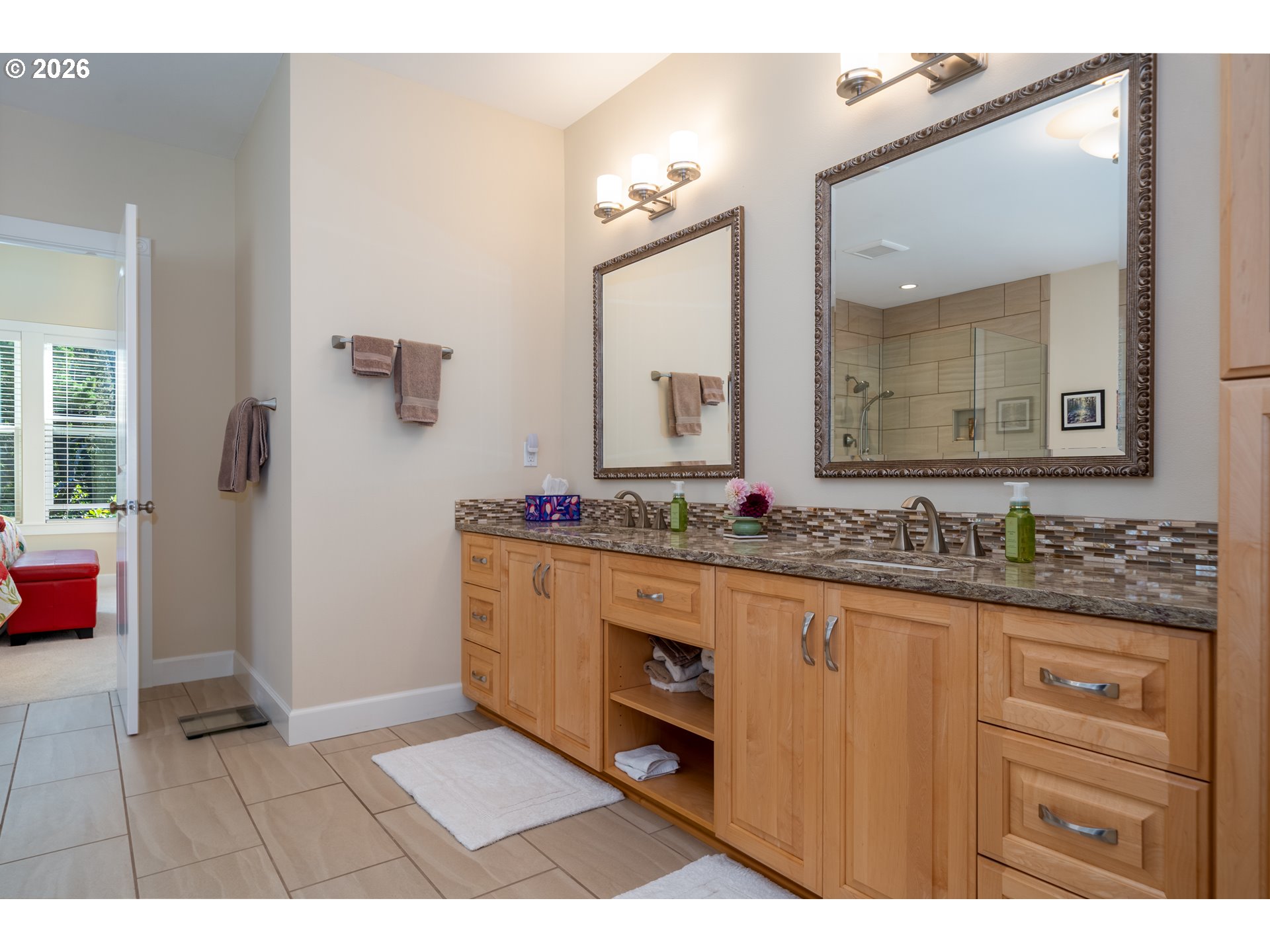 175 Southwest 59th Street South Beach, OR 97366 - Photo 39 of 48 a bathroom with a granite countertop sink a mirror and a
