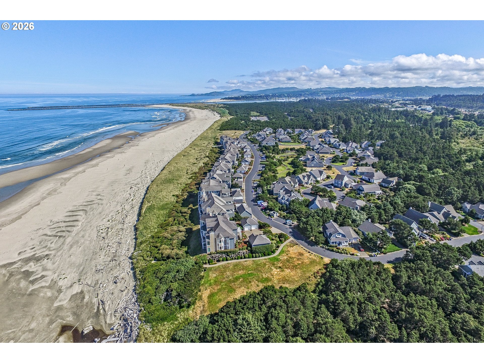 175 Southwest 59th Street South Beach, OR 97366 - Photo 48 of 48 a view of a lake with a mountain