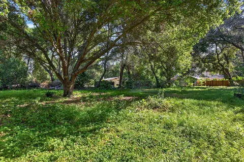 a view of backyard with green space