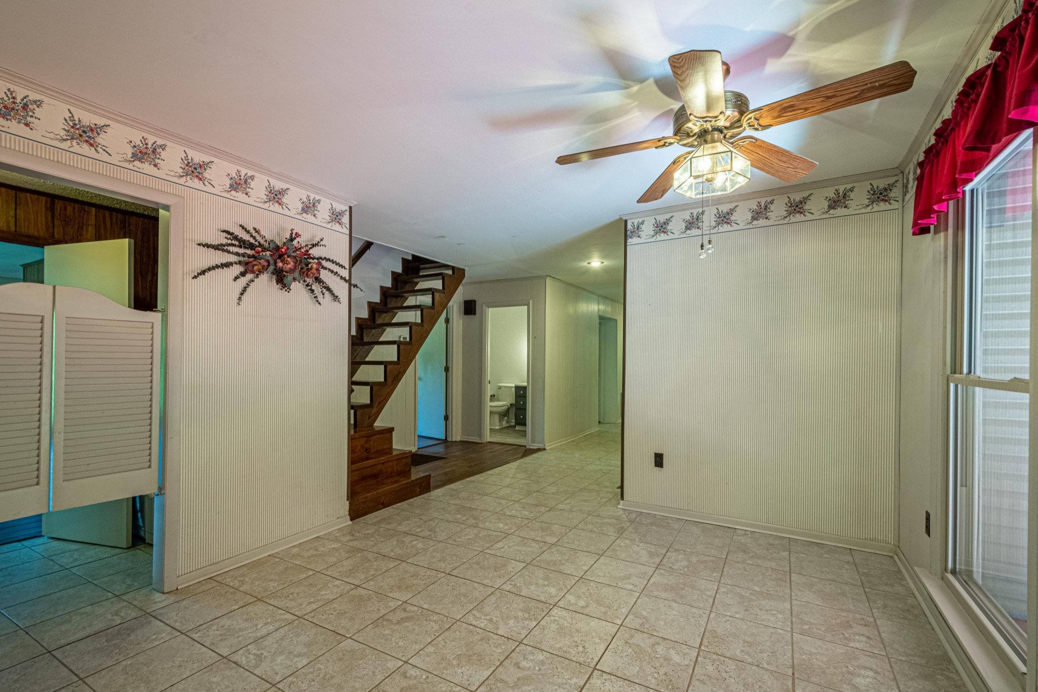 2842 Dog Branch Road Prospect, TN 38477 - Photo 12 of 50 a view of a hallway and a chandelier fan