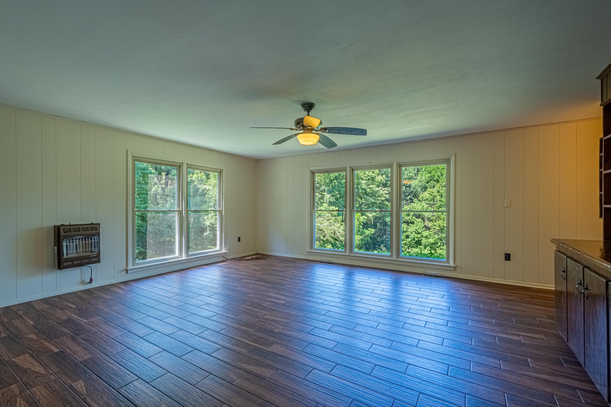 2842 Dog Branch Road Prospect, TN 38477 - Photo 17 of 50 a view of an empty room with wooden floor and a window