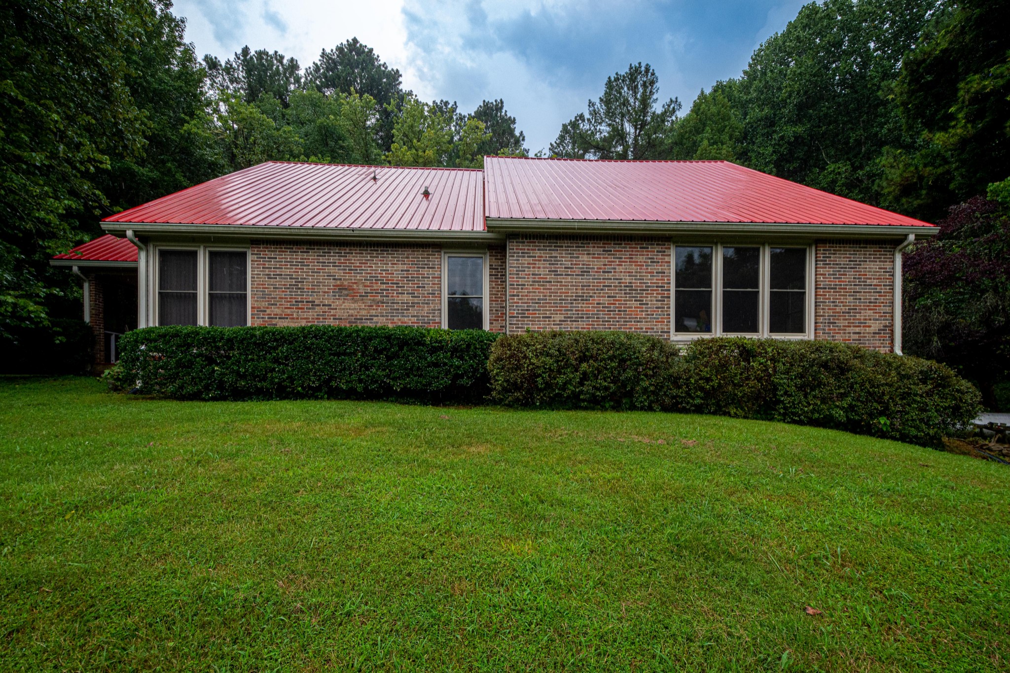 2842 Dog Branch Road Prospect, TN 38477 - Photo 3 of 50 a front view of a house with garden