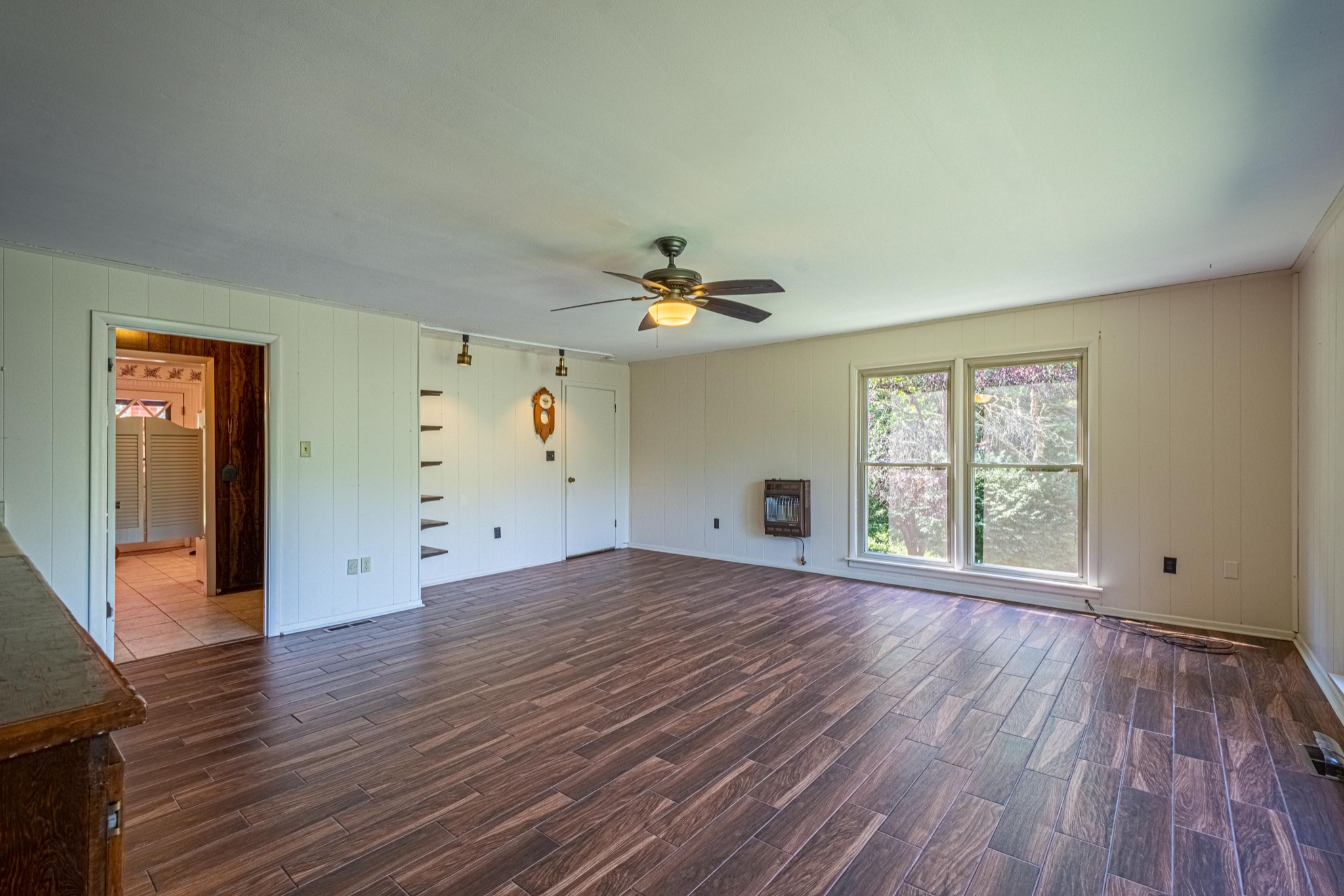 2842 Dog Branch Road Prospect, TN 38477 - Photo 21 of 50 wooden floor in an empty room with a window