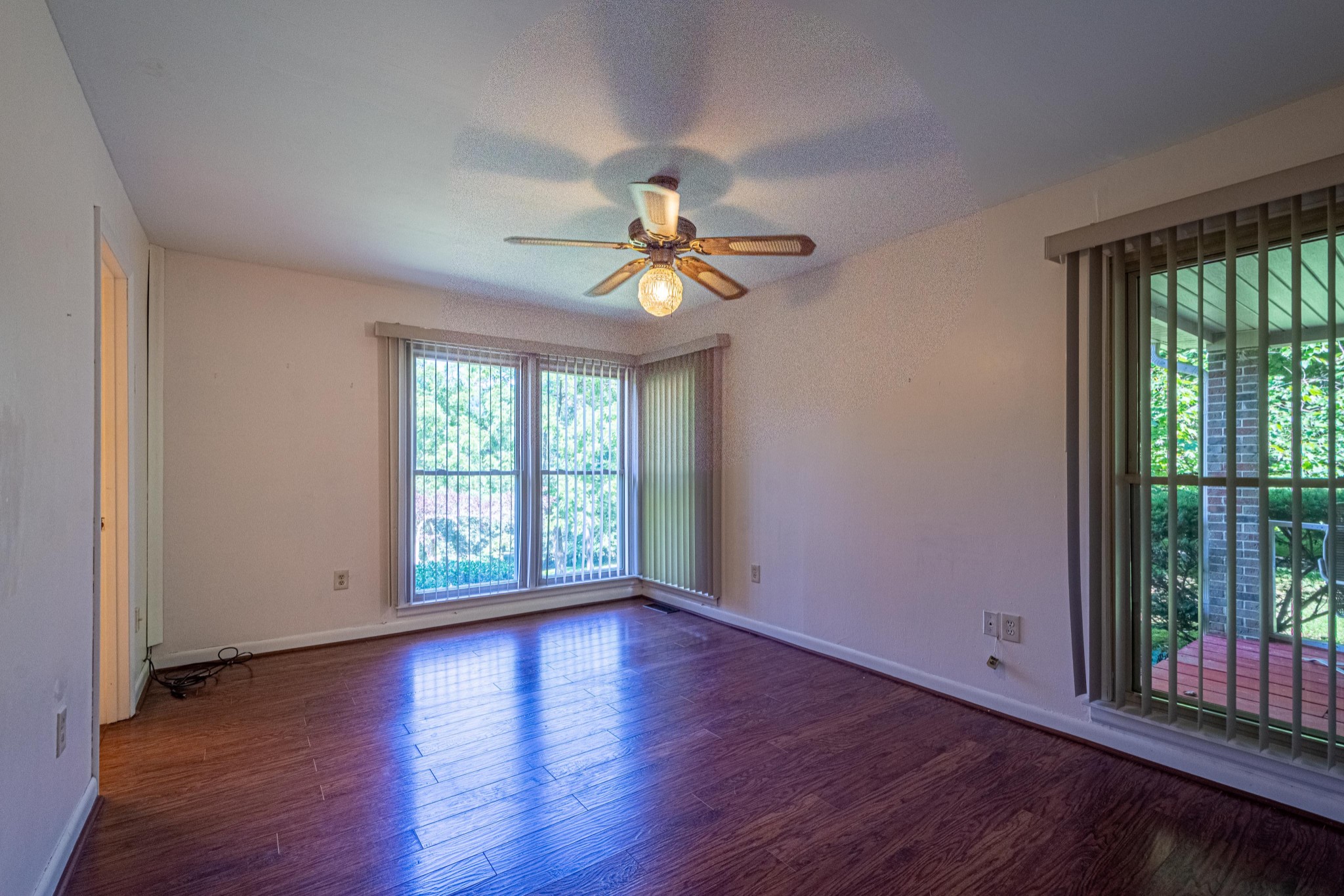 2842 Dog Branch Road Prospect, TN 38477 - Photo 27 of 50 a view of empty room with wooden floor and fan