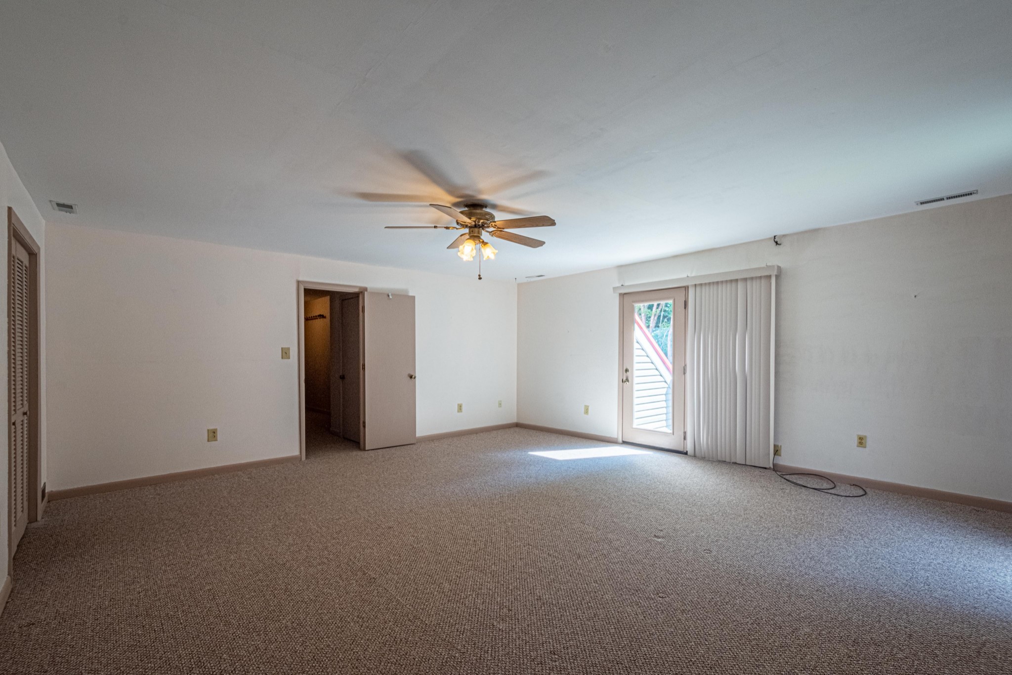 2842 Dog Branch Road Prospect, TN 38477 - Photo 34 of 50 a view of a livingroom with a ceiling fan and window