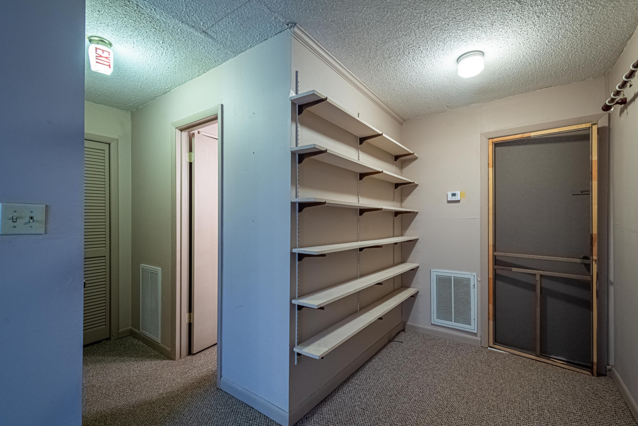 2842 Dog Branch Road Prospect, TN 38477 - Photo 35 of 50 a view of walk in closet with empty racks