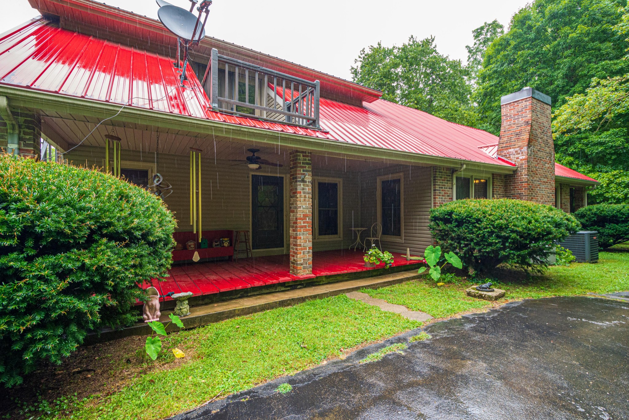 2842 Dog Branch Road Prospect, TN 38477 - Photo 38 of 50 a view of a house with a yard and potted plants