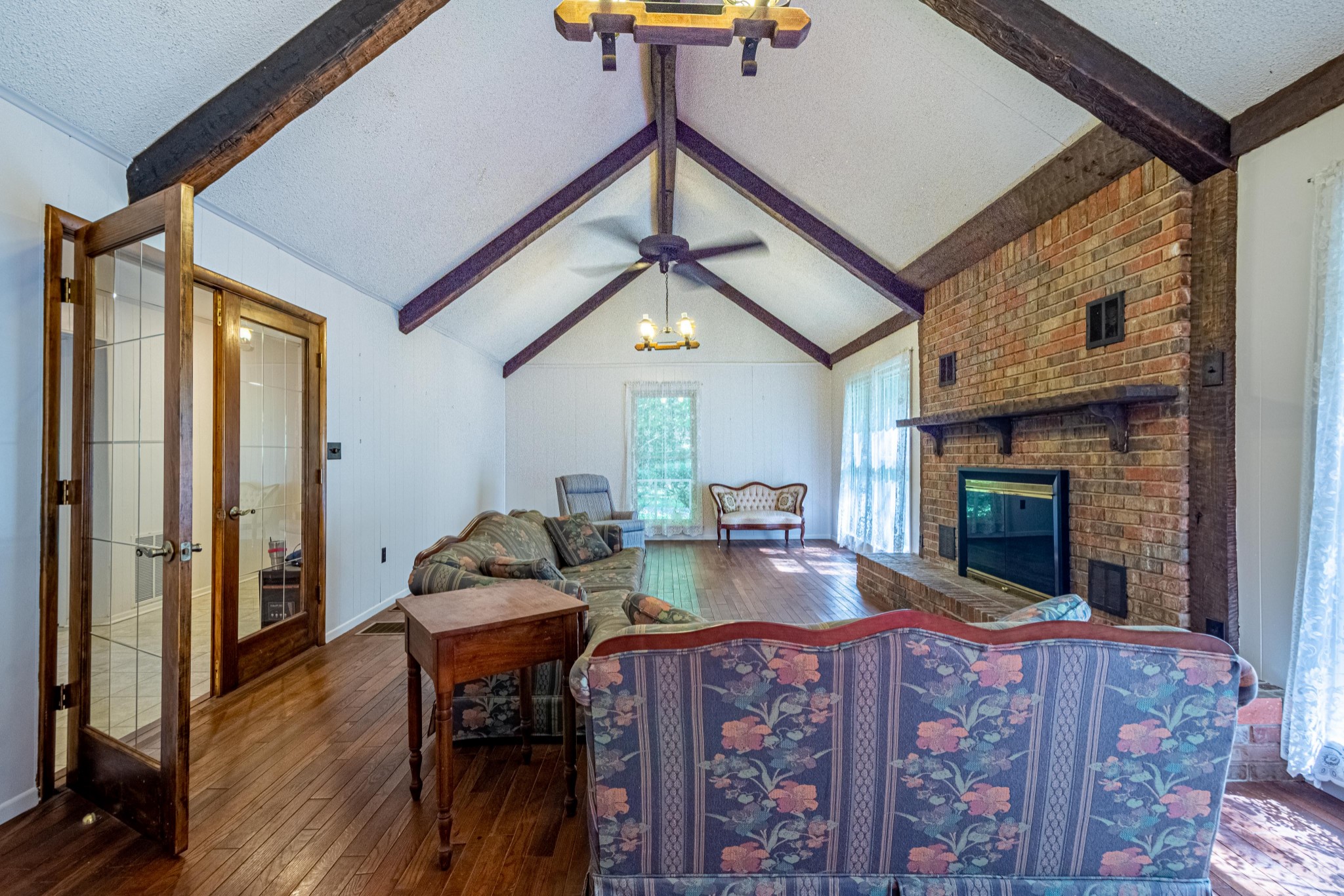 2842 Dog Branch Road Prospect, TN 38477 - Photo 6 of 50 a living room with fireplace furniture and a wooden floor
