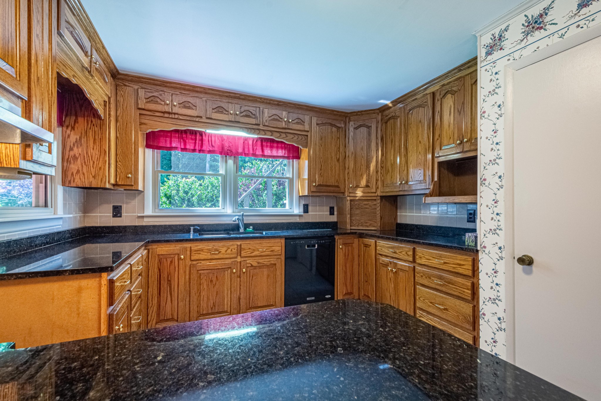 2842 Dog Branch Road Prospect, TN 38477 - Photo 9 of 50 a kitchen with stainless steel appliances granite countertop a stove a sink and a microwave